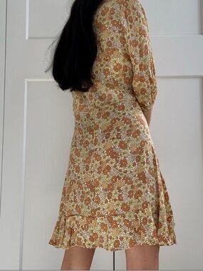 Faithfull The Brand Floral Ruffle-Hem Dress in Rust Yellow